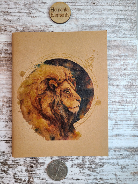 Leo zodiac lion journal with brown, gold, black, red, and teal colors.
